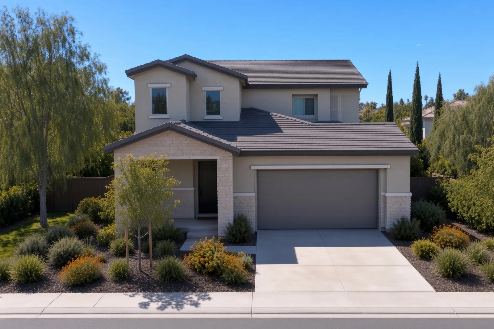 A two-story Las Vegas home in daylight with the lighting switched off and no visible fixtures